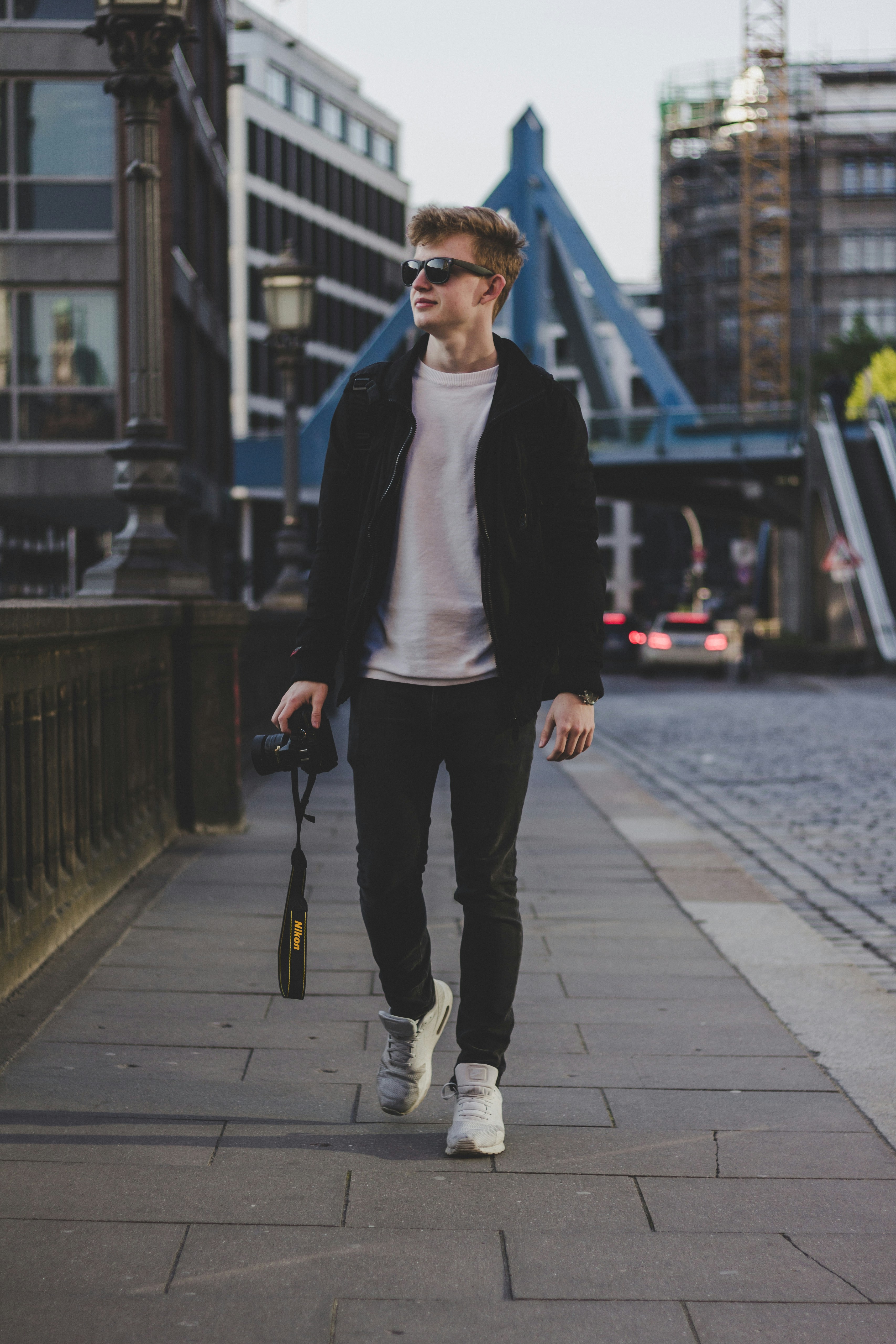 Man walking with a camera