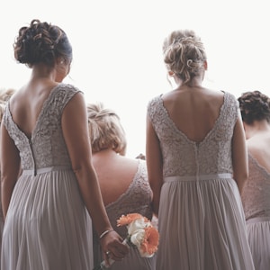bridesmaids wearing gray gowns