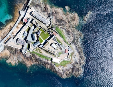 A well-fortified base under construction, showcasing strategic building in a harsh world.