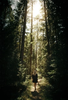 woman walking in the forest