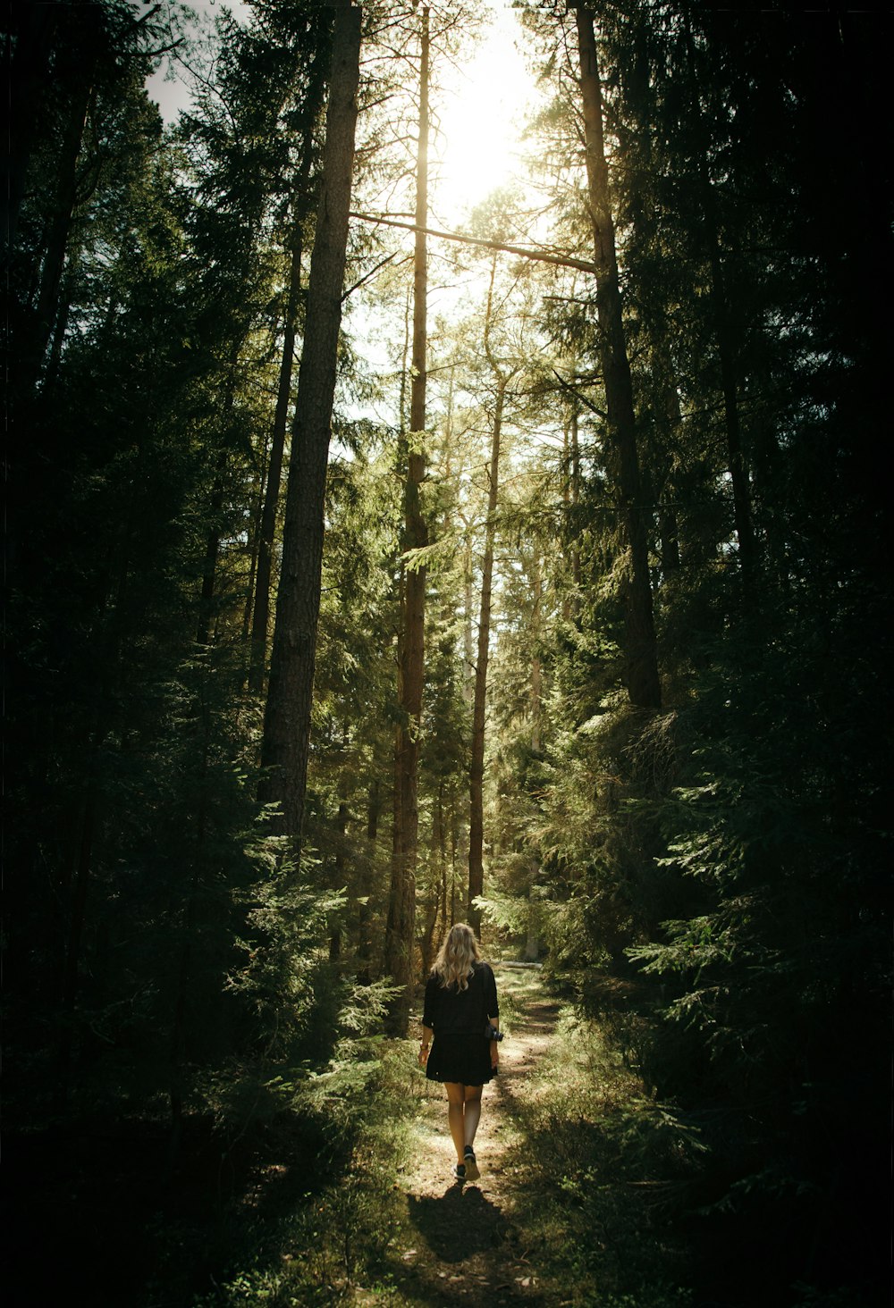 woman walking in the forest