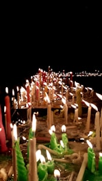 A serene setting with candles and mystical symbols glowing softly in the dark.