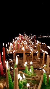 A peaceful setting with candles and soothing colors for meditation therapy.