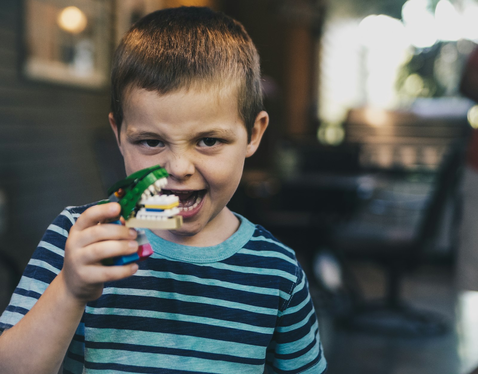 Sony DT 50mm F1.8 SAM sample photo. Boy wearing teal and photography