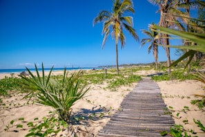 Inviting porch overlooking the sandy path to Vilano Beach.