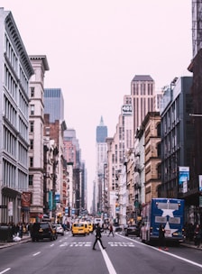 man walking crossing the street