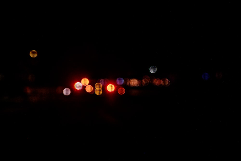 a blurry photo of a street at night