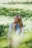 woman standing on grass field