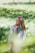 woman standing on grass field