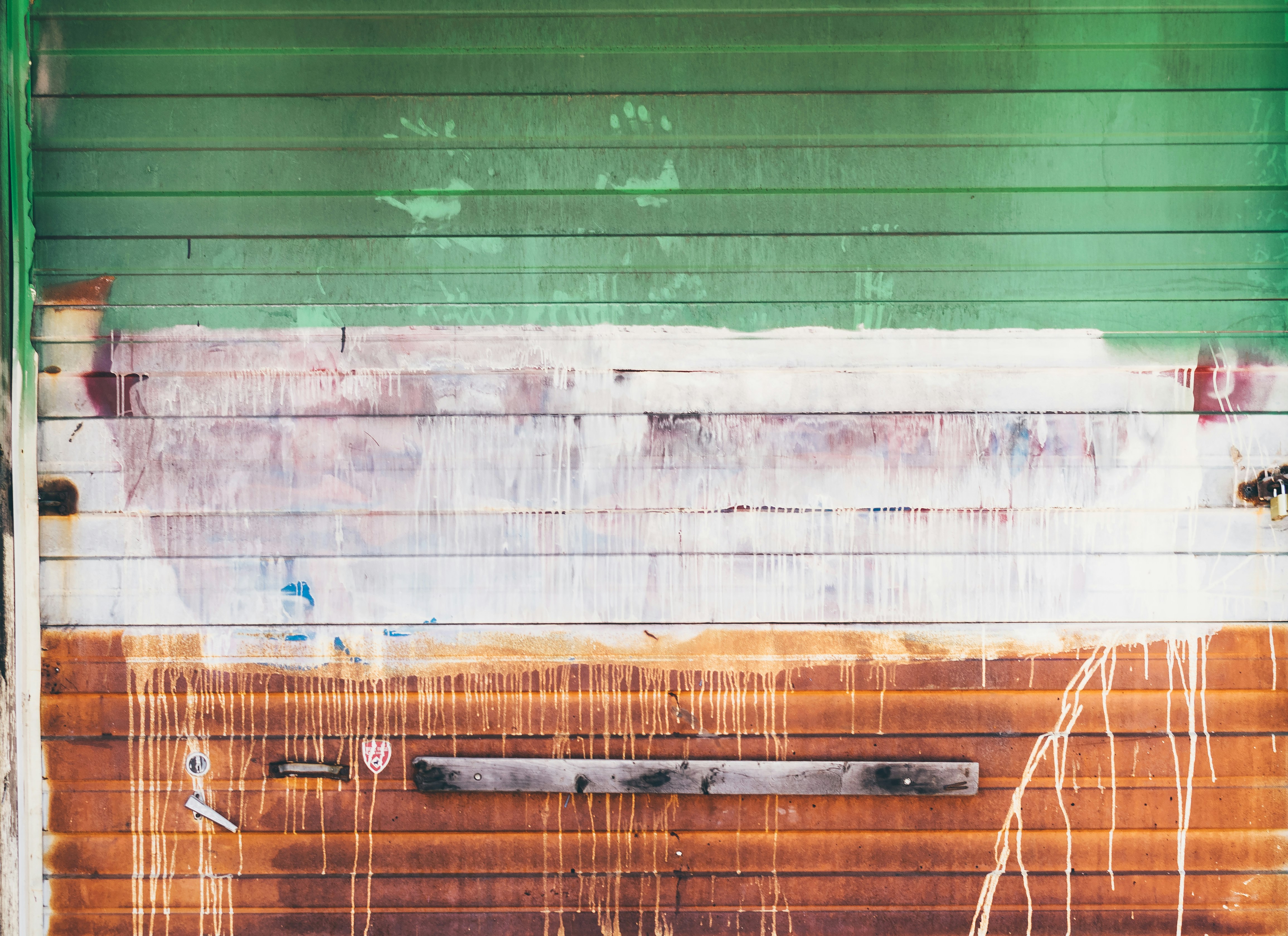 wooden wall with brown and green paint