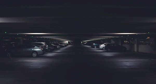 Car Park Management System — Rows of cars parked in a multi-level parking garage