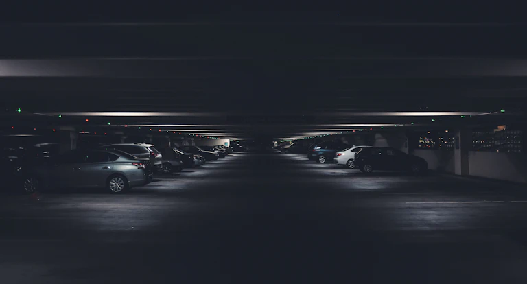 Why Malls and Offices Need a Car Park Management System — Rows of cars parked in a multi-level parking garage