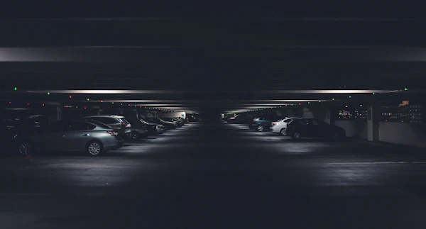 Rows of cars in an underground parking garage