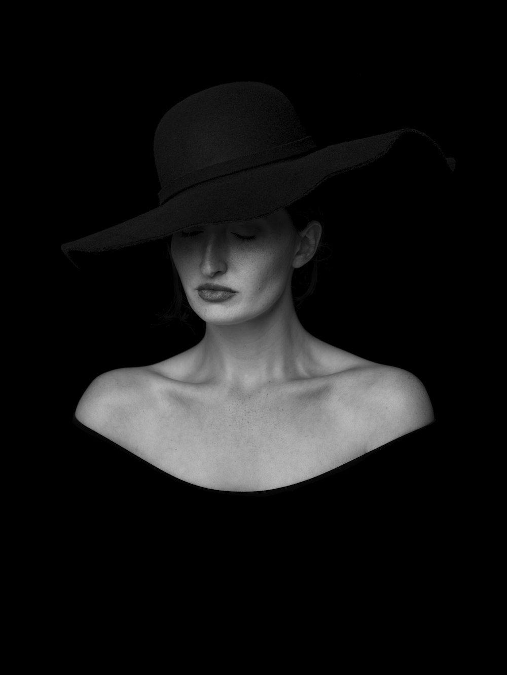 woman in black hat