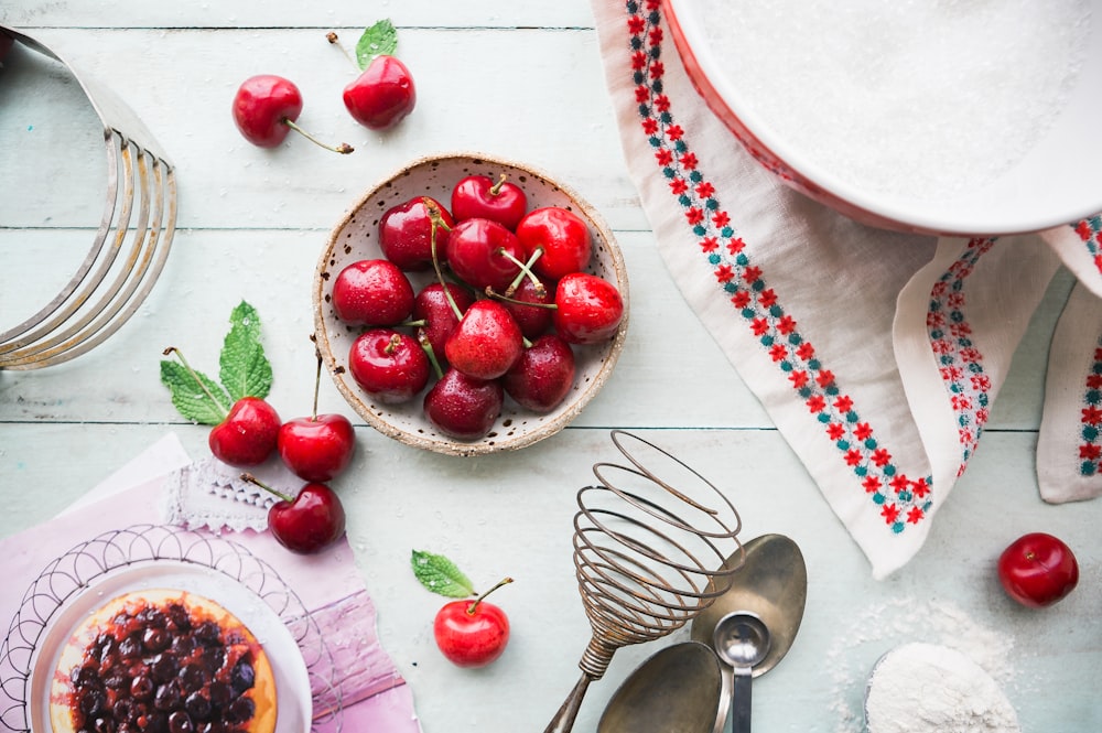 red berries in bowl on table