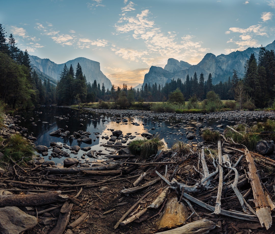 body of water, I’ve quickly discovered that Yosemite National Park is the Disneyland for outdoor enthusiasts and creatives. This is one of my first trips to the park after driving six and a half hours through the night from Los Angeles. At the time I was working a retail job that ended around 10:00PM at night. So I would leave with my wife after my shift and drive through the night to spend my day off at Yosemite. This was captured just after we woke up after a quick hour nap in our cramped Honda Accord.<p></figure>21 24mm photos stitched together.
