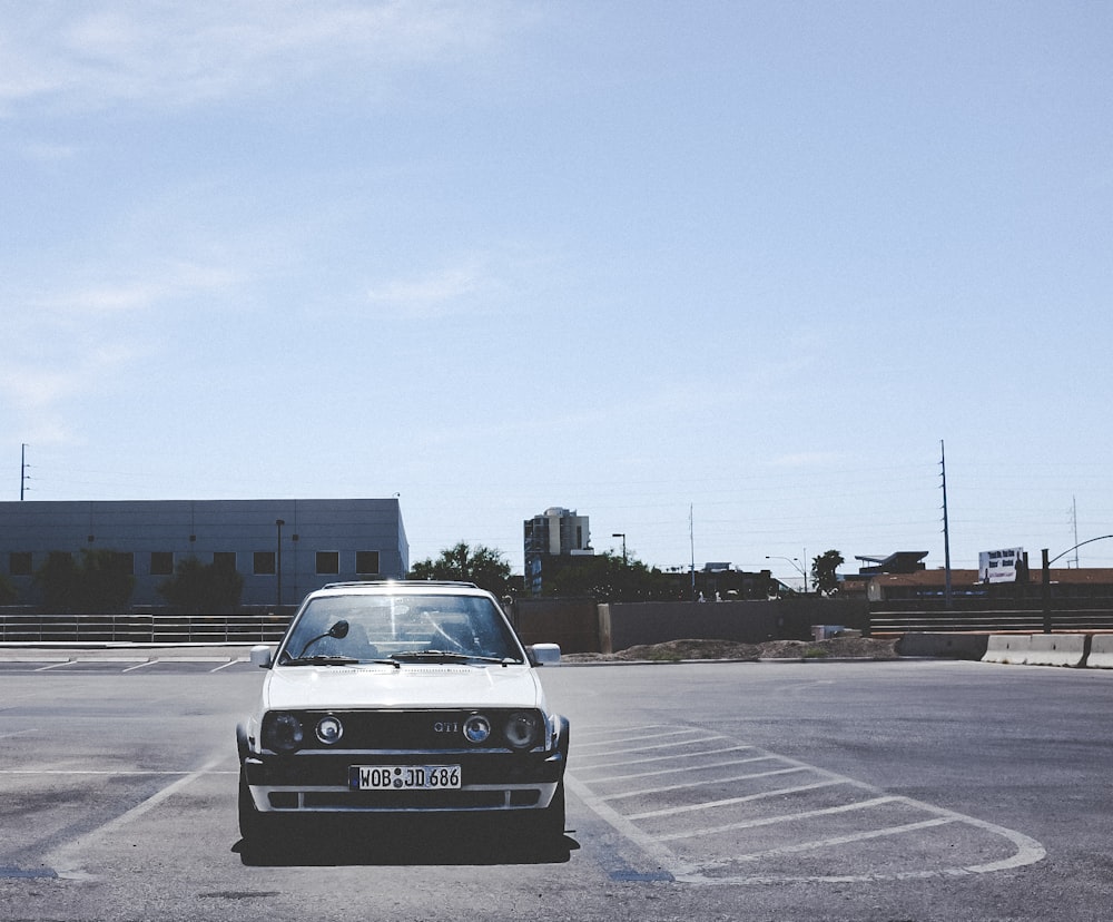 parked white car during daytime