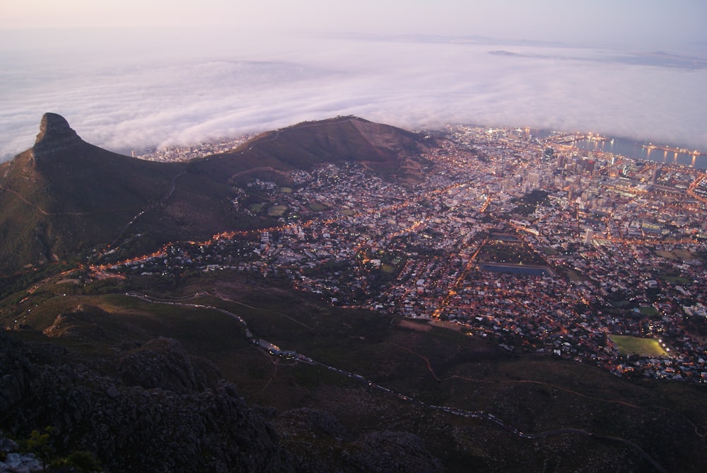 aerial view of houses and mountains