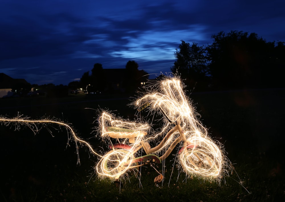 timelapse photograph of bicycle string lights