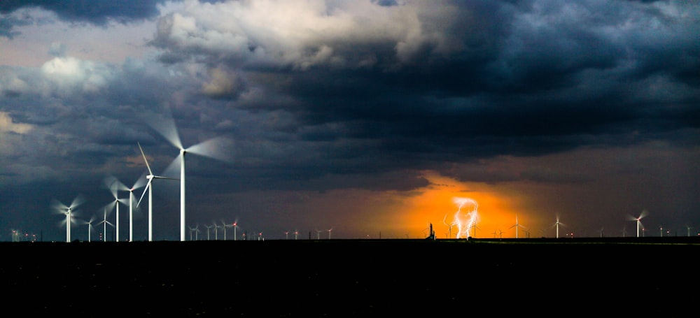 wind mill under cloudy skies