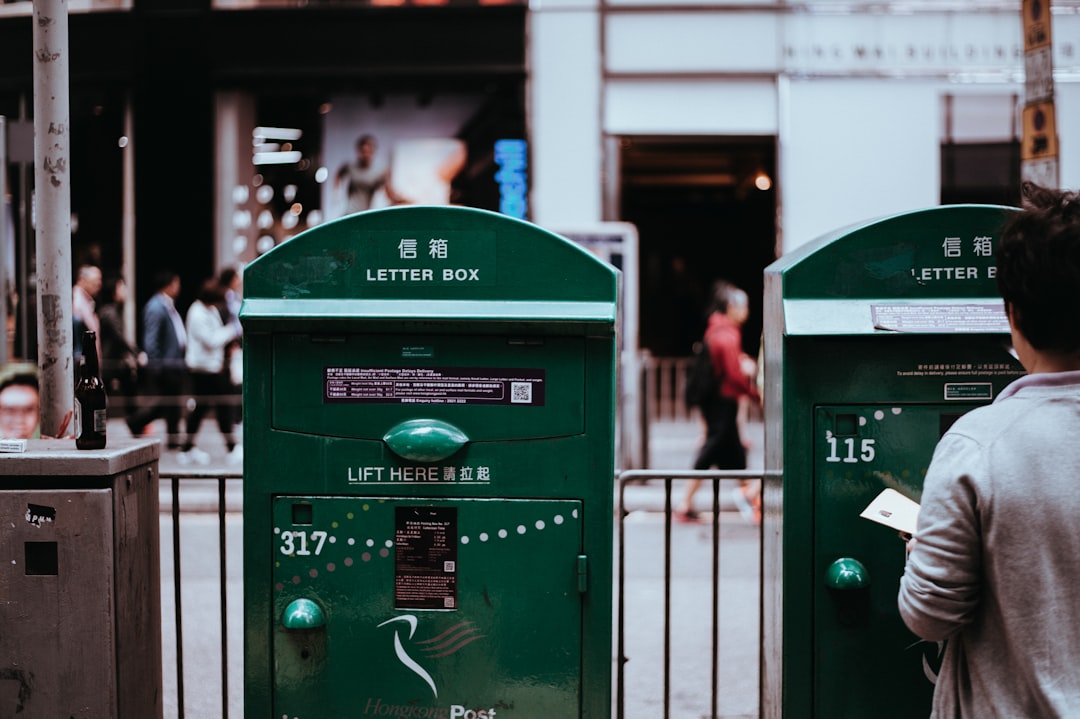 man standing in front of post, “How wonderful it is to be able to write someone a letter! To feel like conveying your thoughts to a person, to sit at your desk and pick up a pen, to put your thoughts into words like this is truly marvelous.”<p></figure>― Haruki Murakami, Norwegian Wood