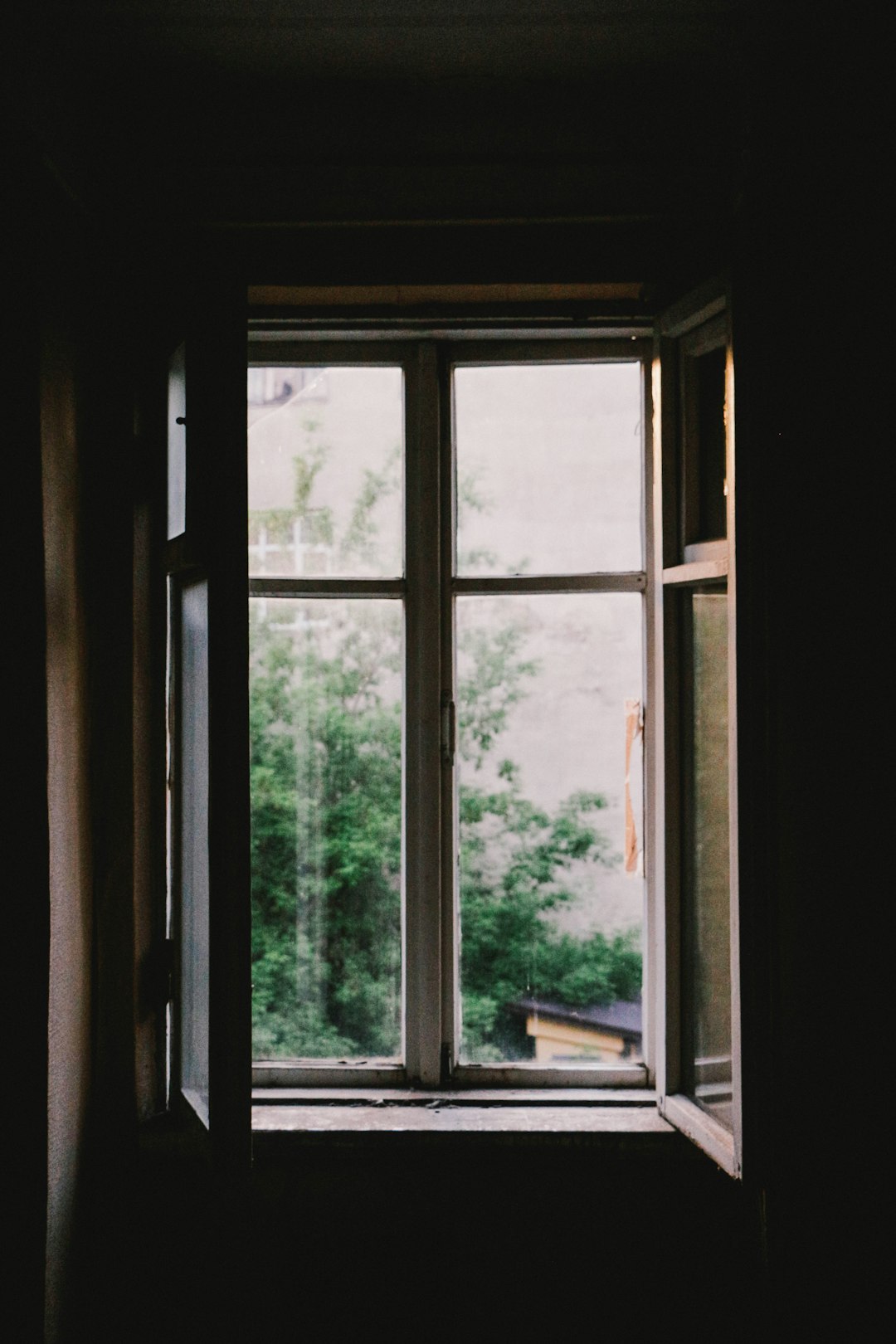  open casement window near plants window