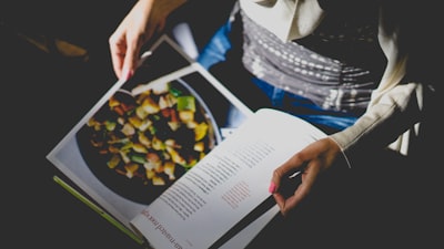 person looking at magazine recipe zoom background