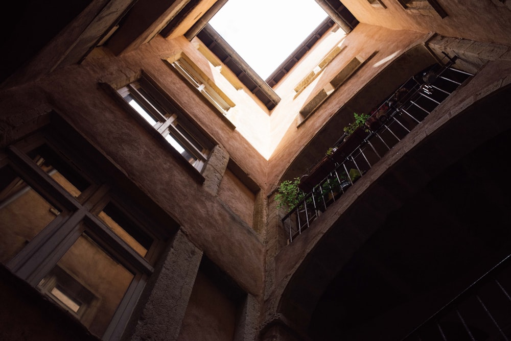 a building with a skylight and a balcony