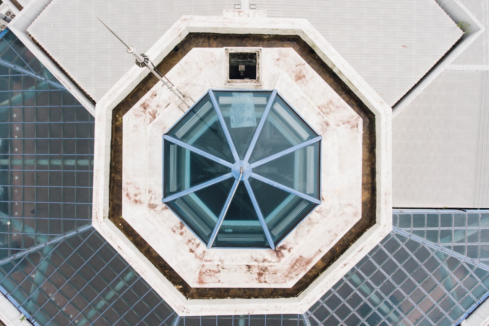 low-angle photography of white and black building