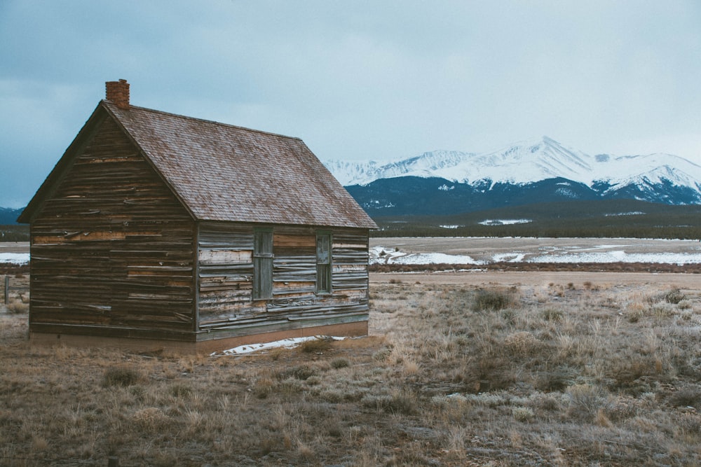 brown barn on field