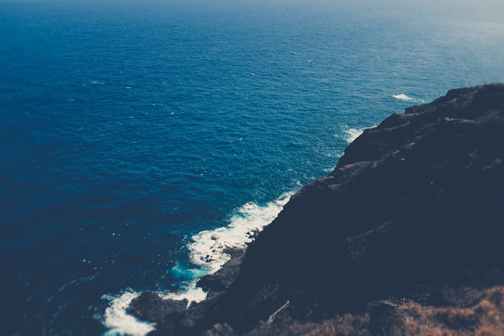 a view of the ocean from a cliff