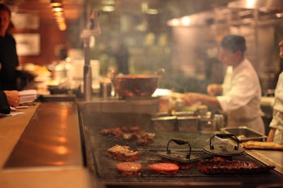 A vibrant restaurant setting showcasing a busy kitchen.