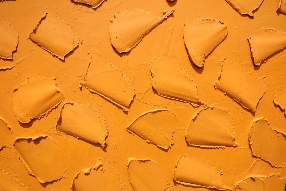 a close up of a yellow paint texture