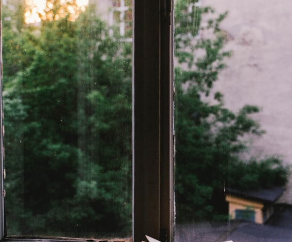 book near glass window