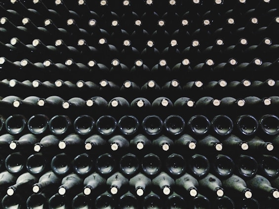 Close-up of high-quality rubber stoppers arranged neatly on a wooden surface.