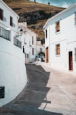 man walking near houses