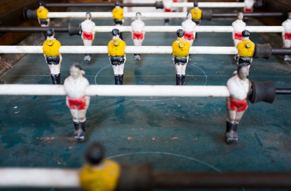 selective focus photography foosball table