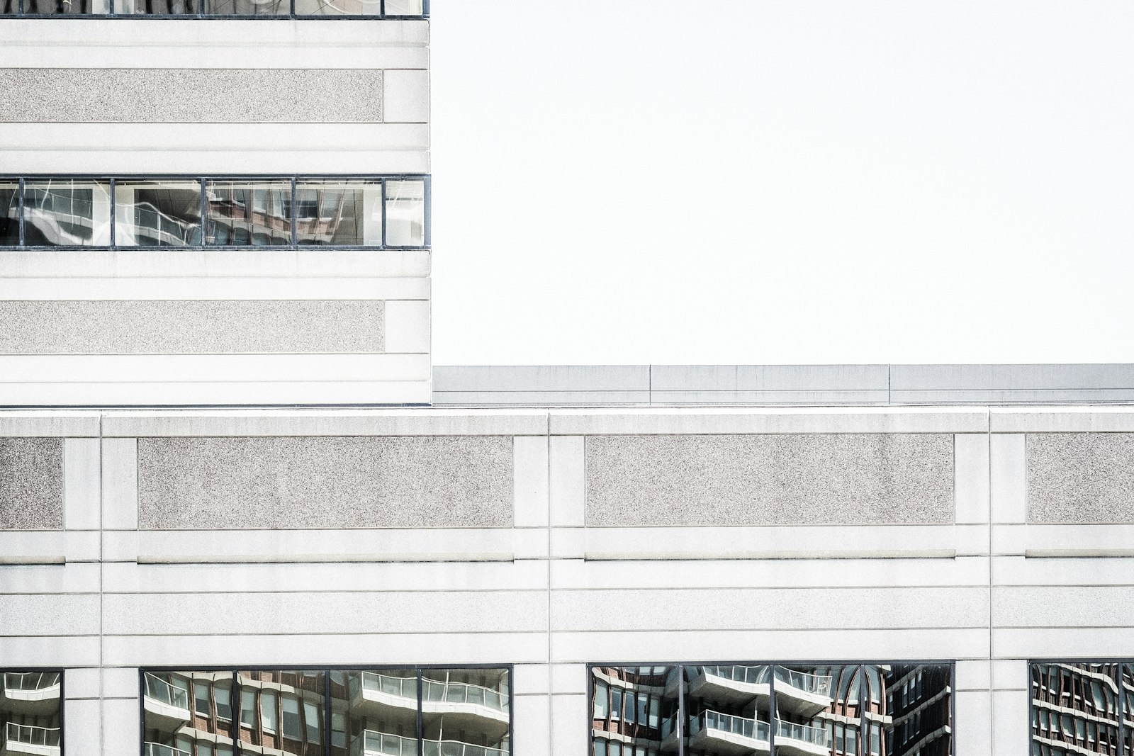 Fujifilm X-T2 + Fujifilm XF 56mm F1.2 R sample photo. White concrete building photography