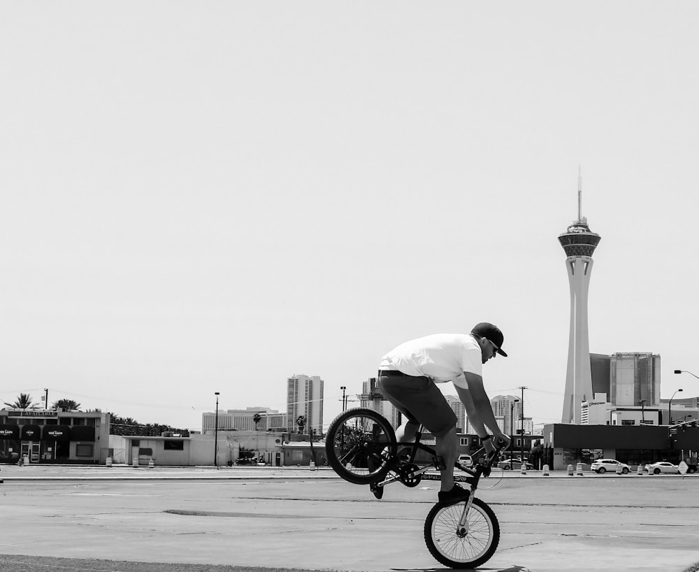 man riding BMX bike doing tricks