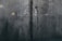 A close-up view of a textured, industrial metal surface with visible welding marks running vertically. The metal displays various stains and discolorations, giving it an aged and worn appearance. Light reflections and subtle rust patches add to the surface's character.