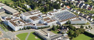 Close-up of modern industrial buildings with clean, wide internal roads.