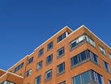 Exterior shot of the 125 Cherry Street building under a clear blue sky.