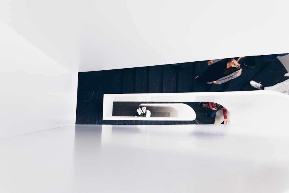 woman walking on spiral staircase