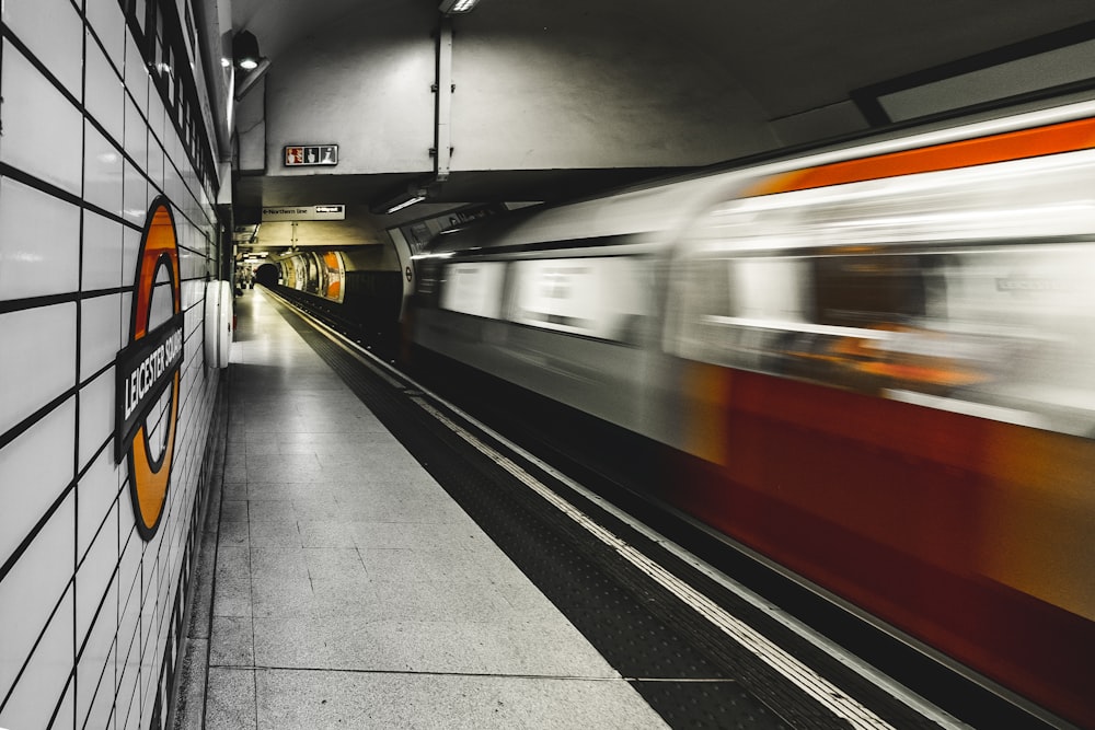 time-lapse of train on subway