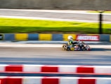 man riding on go-kart