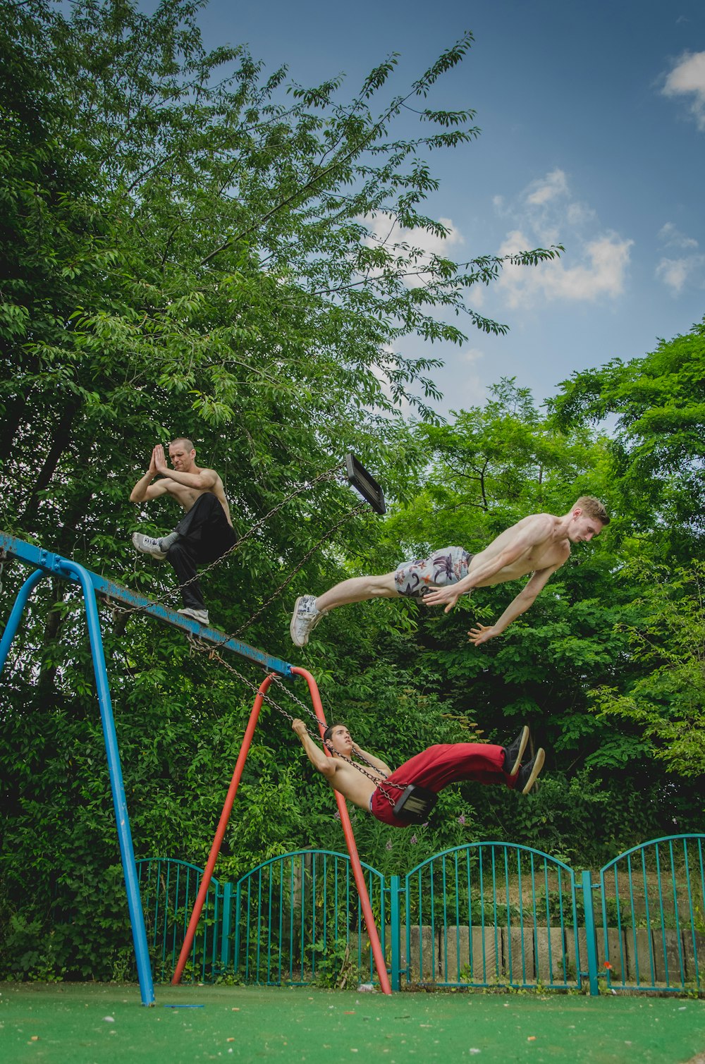 Older boys meditating and jumping off a swing set.