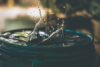 water drop on bucket photo