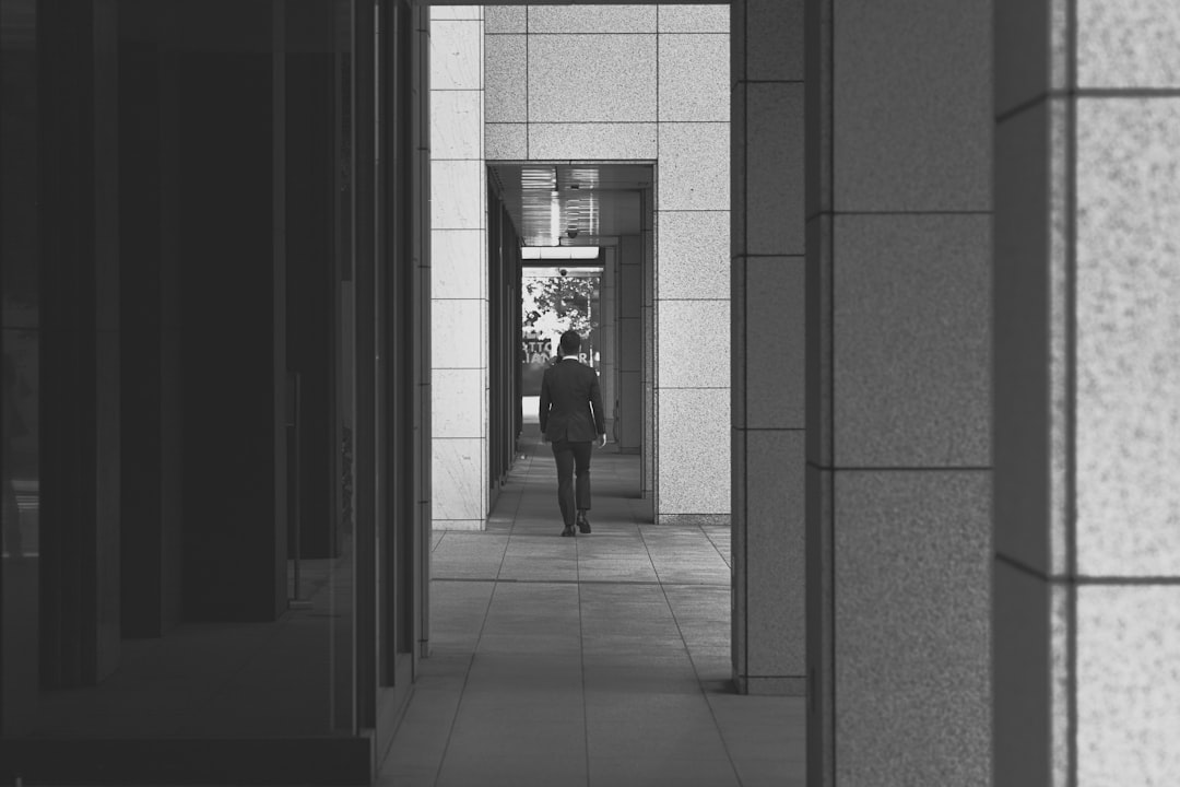 man walking on hallway