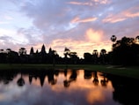 Sunset over the ancient temples of Angkor Wat in Cambodia.