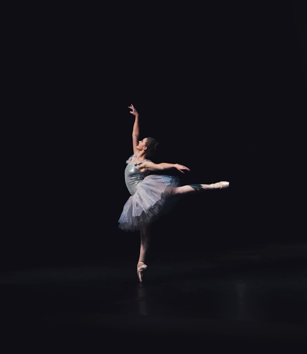 photography of dancing ballerina
